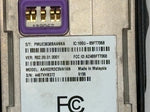 Close-up of a computer hardware component with label and branding