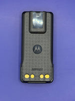 Motorola IMPRES device on a purple background