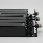 Black electronic device with connectors on a gray background