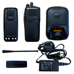 Motorola two-way radio set with charger, battery, and accessories on a white background